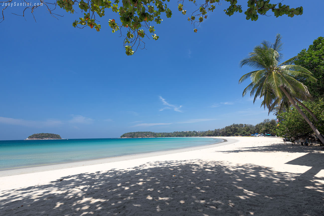 Shot of Kata beach with white sand and blue sky in the background