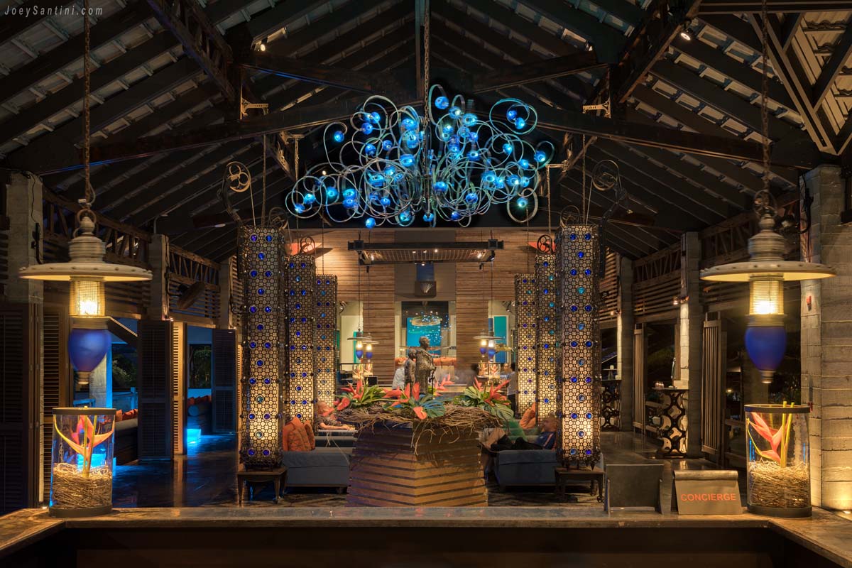 Shot of the Lobby with blue chandelier and dark ceiling
