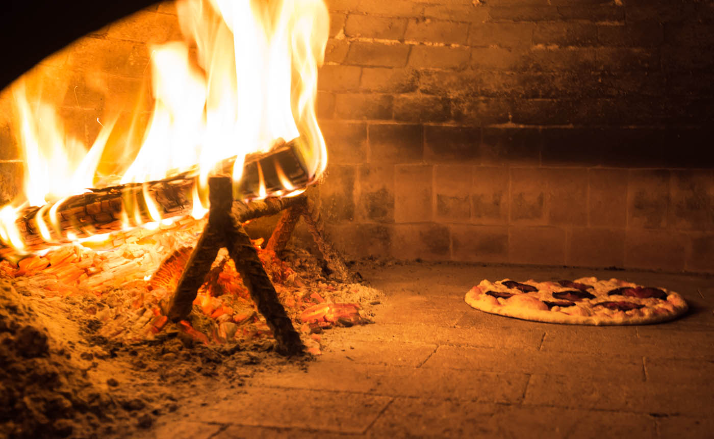 Wood oven with pizza