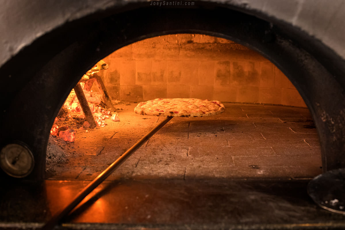 Pizza inside the wood oven