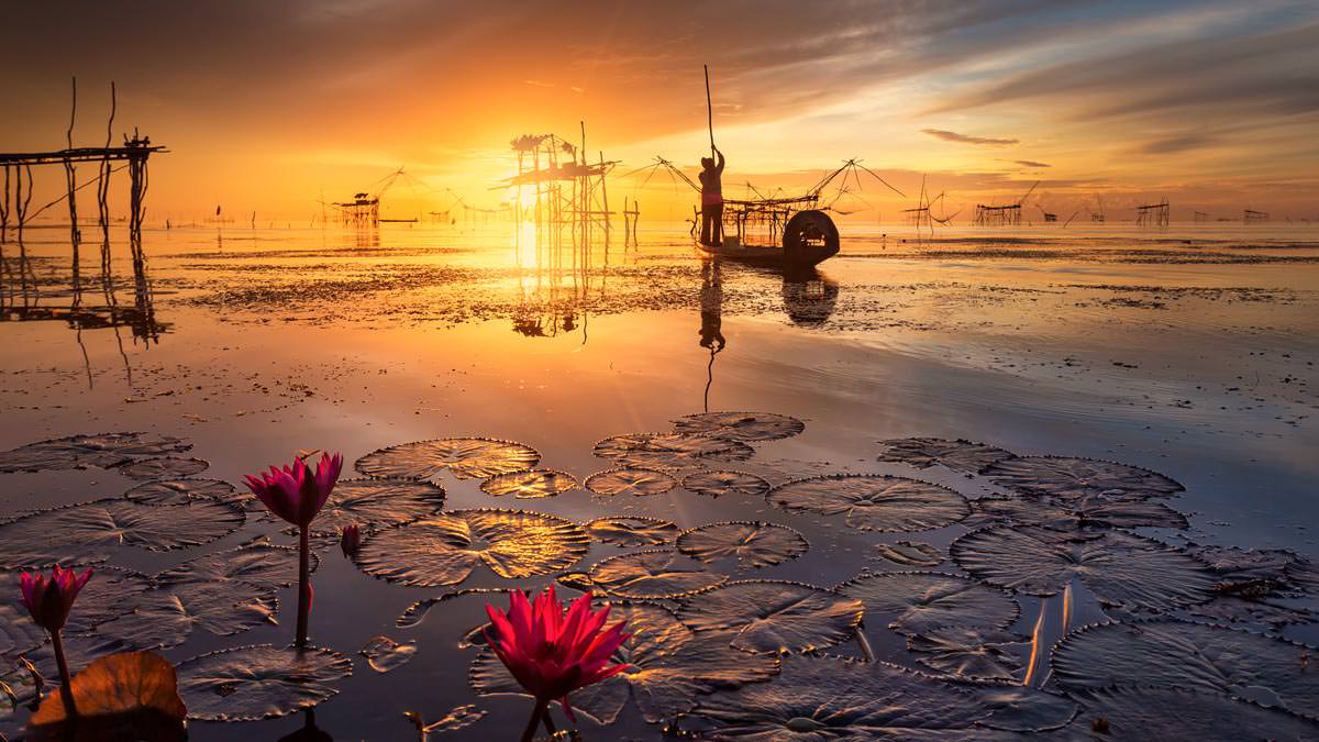 Fantastic sunrise at Phatthalung lake in Thailand