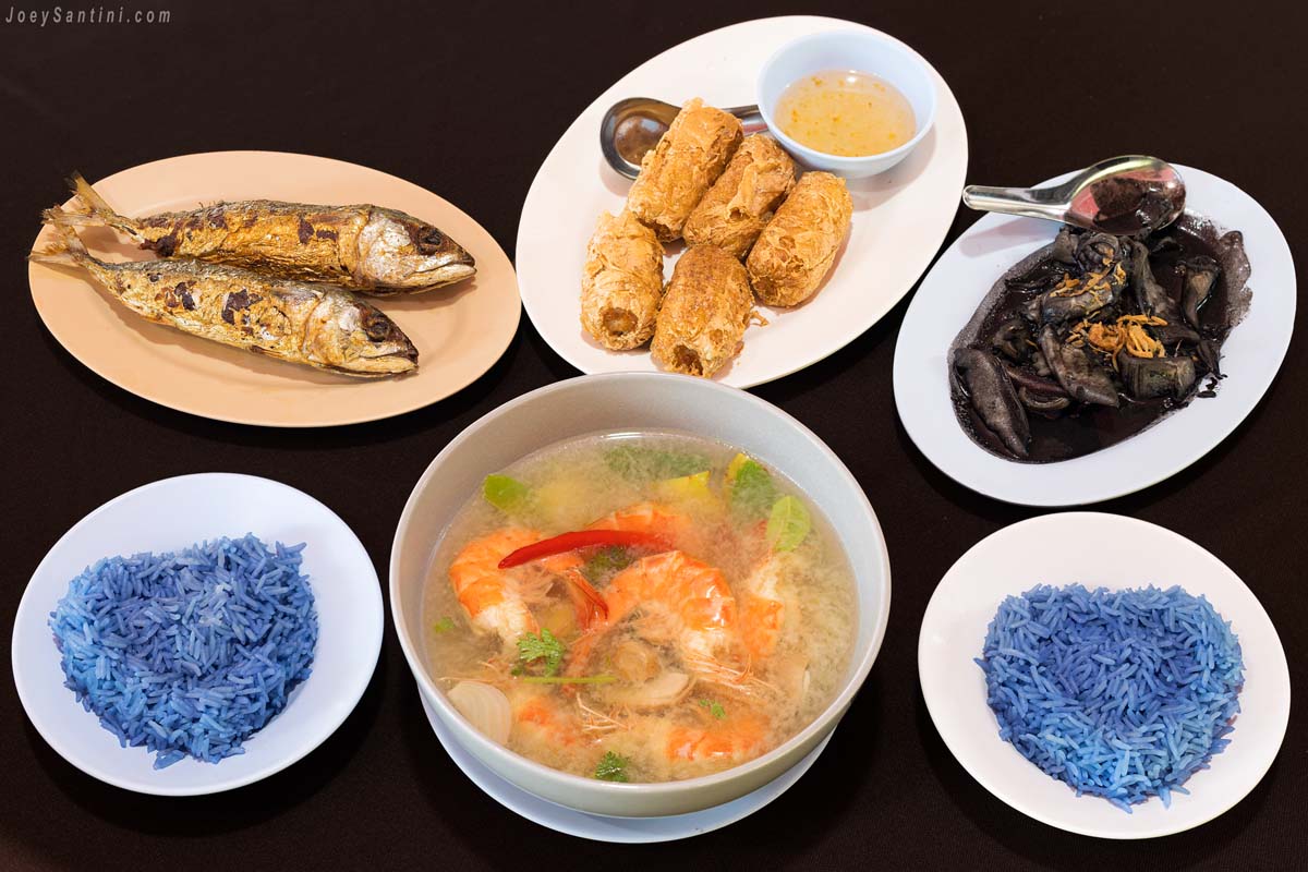 Blue rice, grilled fish, black squid, soup and fish balls