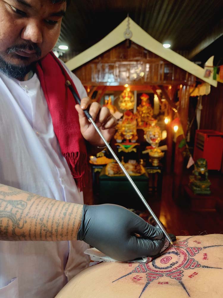 Showing a metal silver stick and orange background