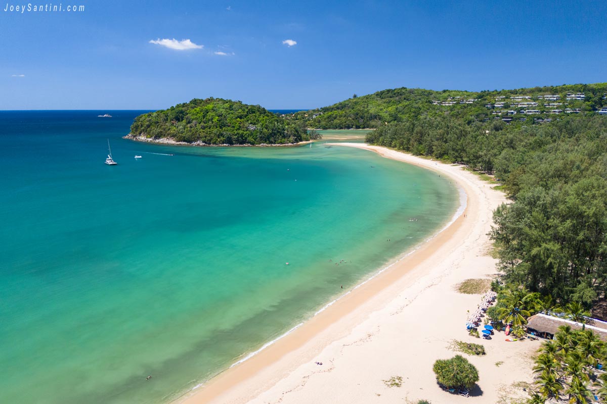 high aerial view of layan beach phuket coastline turquoise sea and koh kala island
