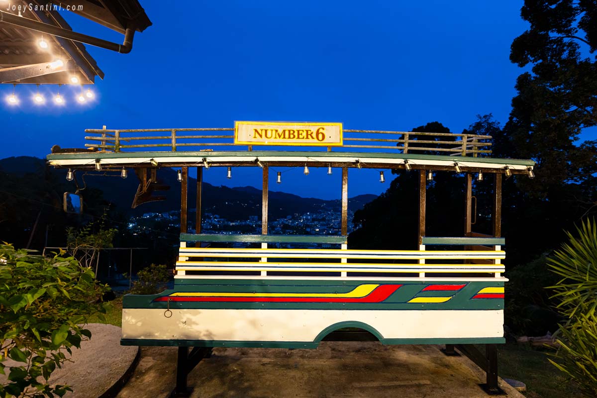 Colorful traditional songthaew bus at No 6 restaurant up the hill Patong Phuket