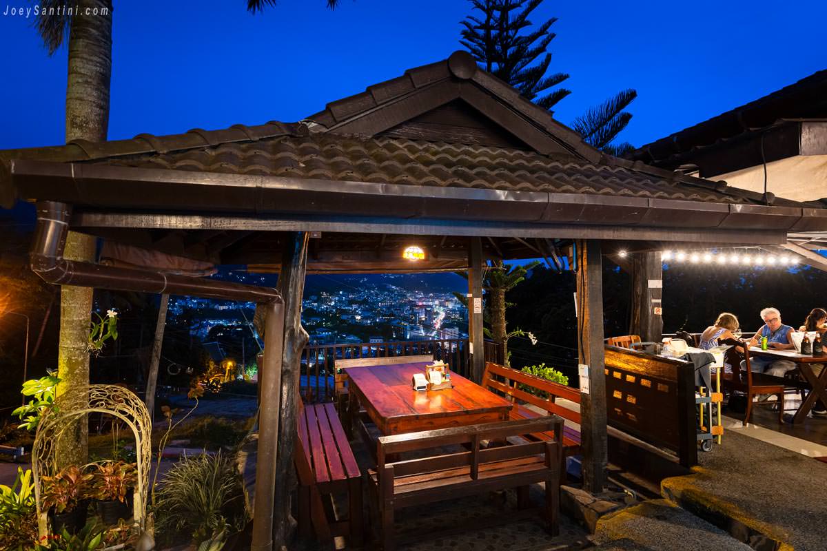 No 6 Restaurant Up The Hill Patong wooden pavilion seating with city lights view