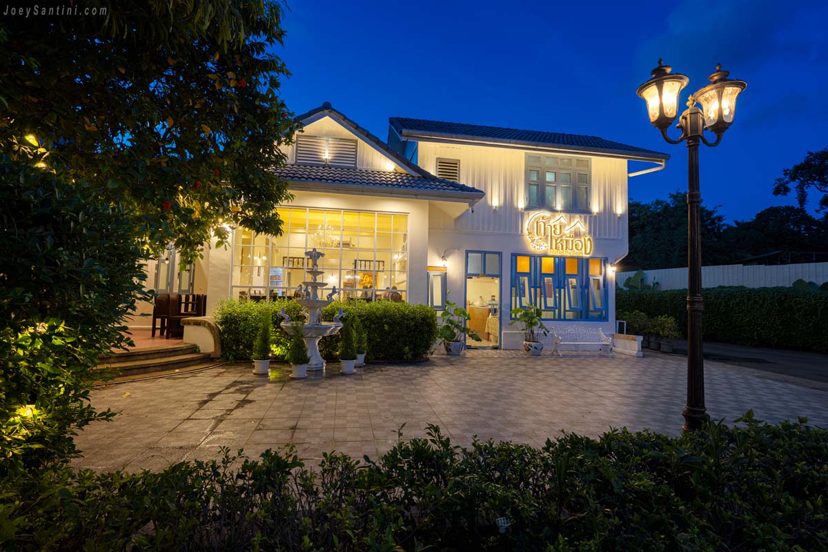Thai Mueang Restaurant in Phuket Town illuminated during dusk blue hour