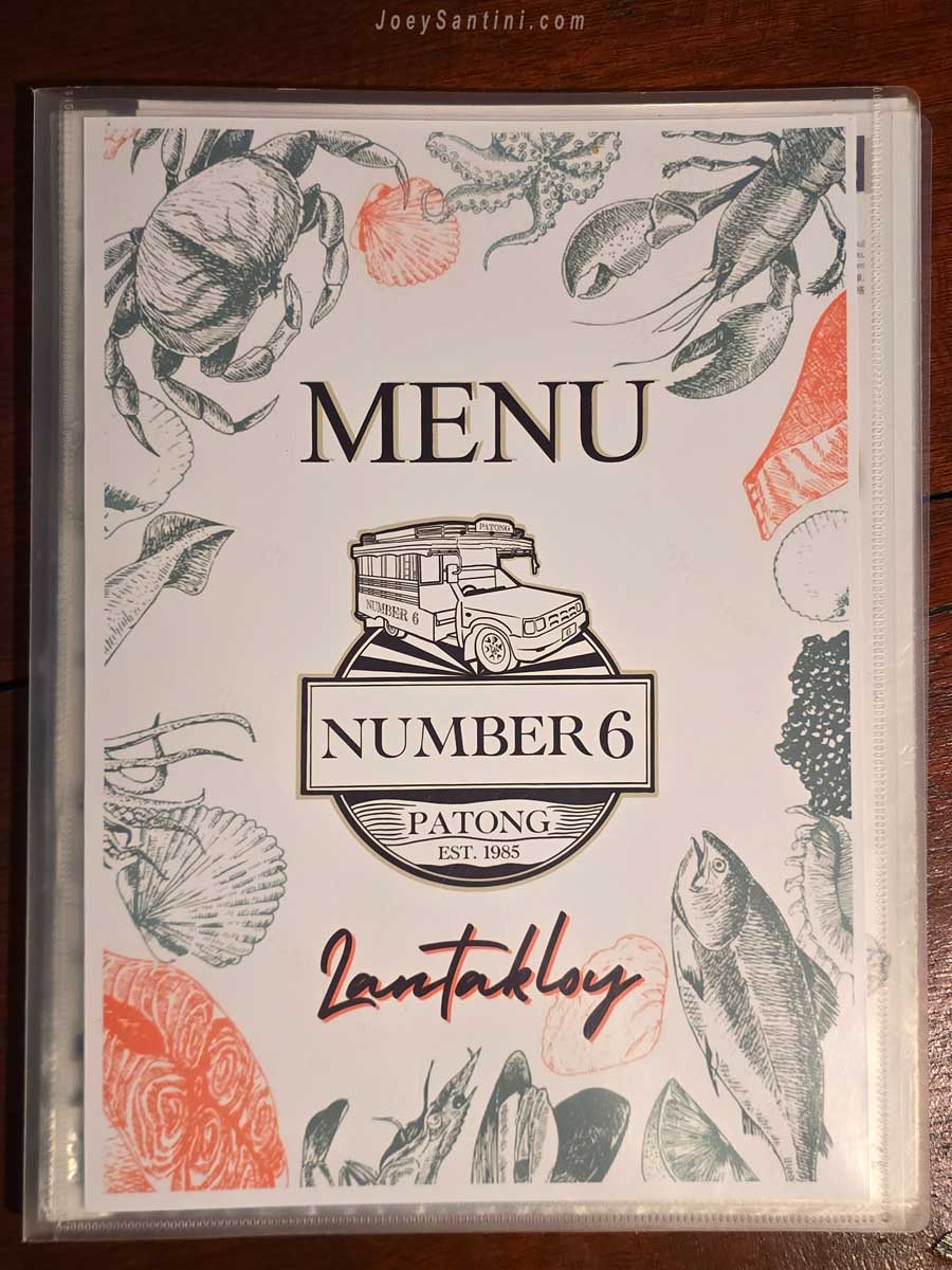 Number 6 patong restaurant menu cover with seafood illustrations and truck logo